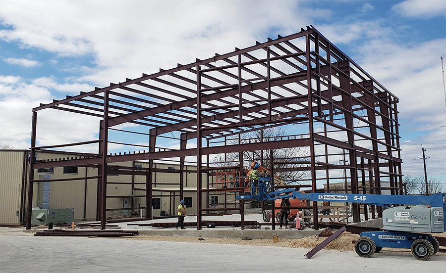 Expanding Again: Construction of New Building Underway | Cox ...